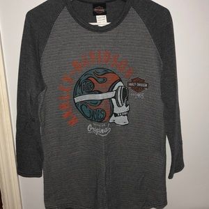 3/4 sleeve Harley Davidson shirt.